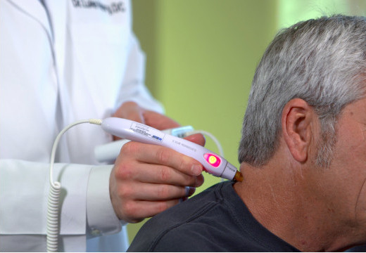 Low-level laser therapy treatment for pain relief at Henry Clinic in Greenville SC